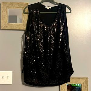 Black glitter sequined sleeveless top.